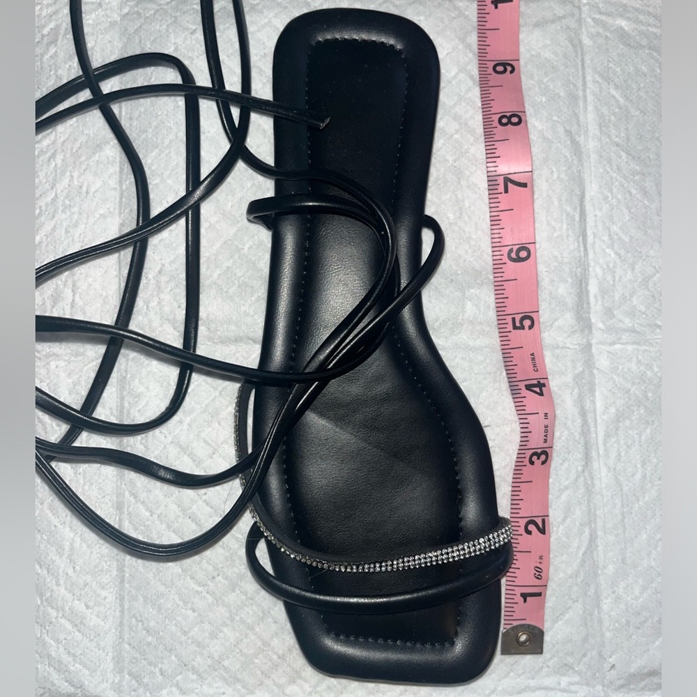 Gladiator tie up sandals with unique gem studded front strip for extra shine.